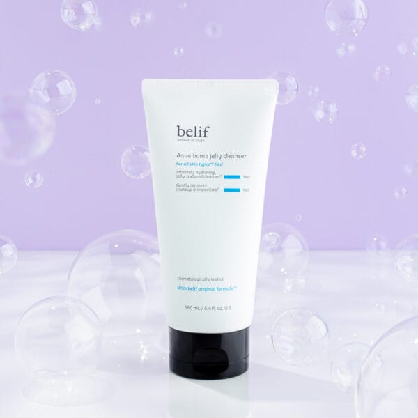 belif Jelly-to-Foam Cleanser 160ml - Gentle facial cleanser with hyaluronic acid & herbs. Product, bubbles and lilac background. 