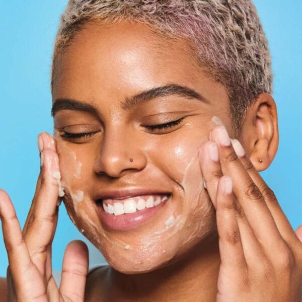 belif Cleansing Balm 100ml - Moisturizing make-up removing balm with lotus flower & vitamin E. Picture with woman using the product