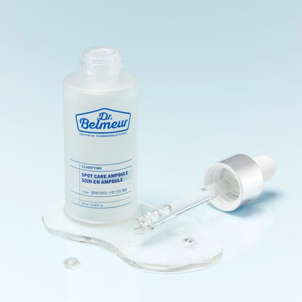 Dr. Belmeur Spot Care Ampoule 22ml – beruhigendes Serum mit Panthenol, Beta-Glucan, Chaga-Pilz und Teebaumöl gegen Unreinheiten und Rötungen. Abbildung Pipette und klare Flüssigkeit, Serum.