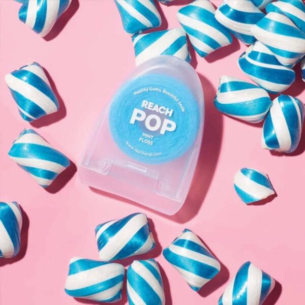 REACH POP Zahnseide Minze – vegane, gewachste Zahnseide mit 384 Mikrofäden & nachhaltiger Verpackung, 50m. Abbildung mint candy flavor.