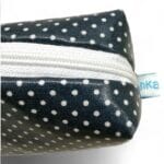 Cosmetic bag in navy blue/white handmade size 22x7x5cm close-up view closed